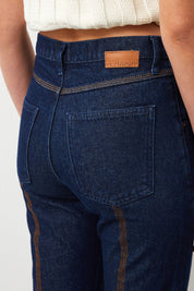 Close-up of back pocket detail on Mira Boyfriend Fit Dark Blue Embroidered Jeans