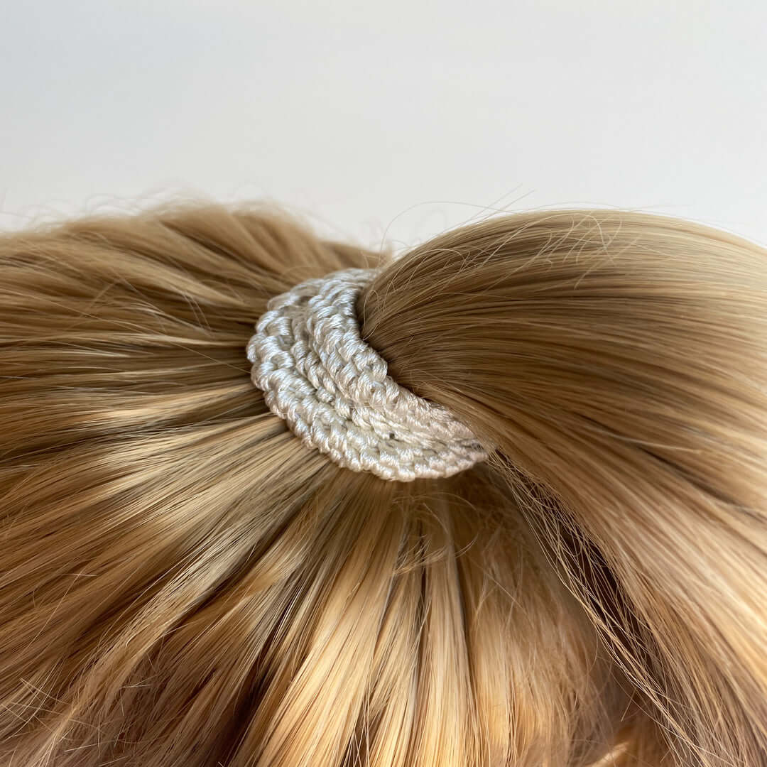 Kknekki Ivory Hair Elastic worn in a ponytail, showcasing its durability and stylish design