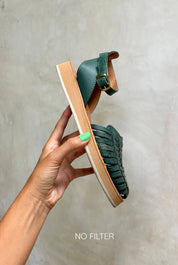 Close-up of the handwoven leather detail and platform sole on the Chetumal huaraches.