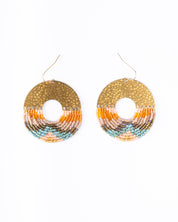 Mayana Designs Earth Ombre Fringe Disk Earrings, showcasing vibrant peach, orange, and turquoise beads with a hammered brass arch