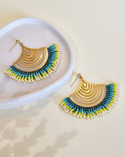 Close-up of Mayana Designs’ Beaded Handwoven Flamenco Fan Earrings in Aqua, showcasing ruffled Miyuki glass beads and brass components.