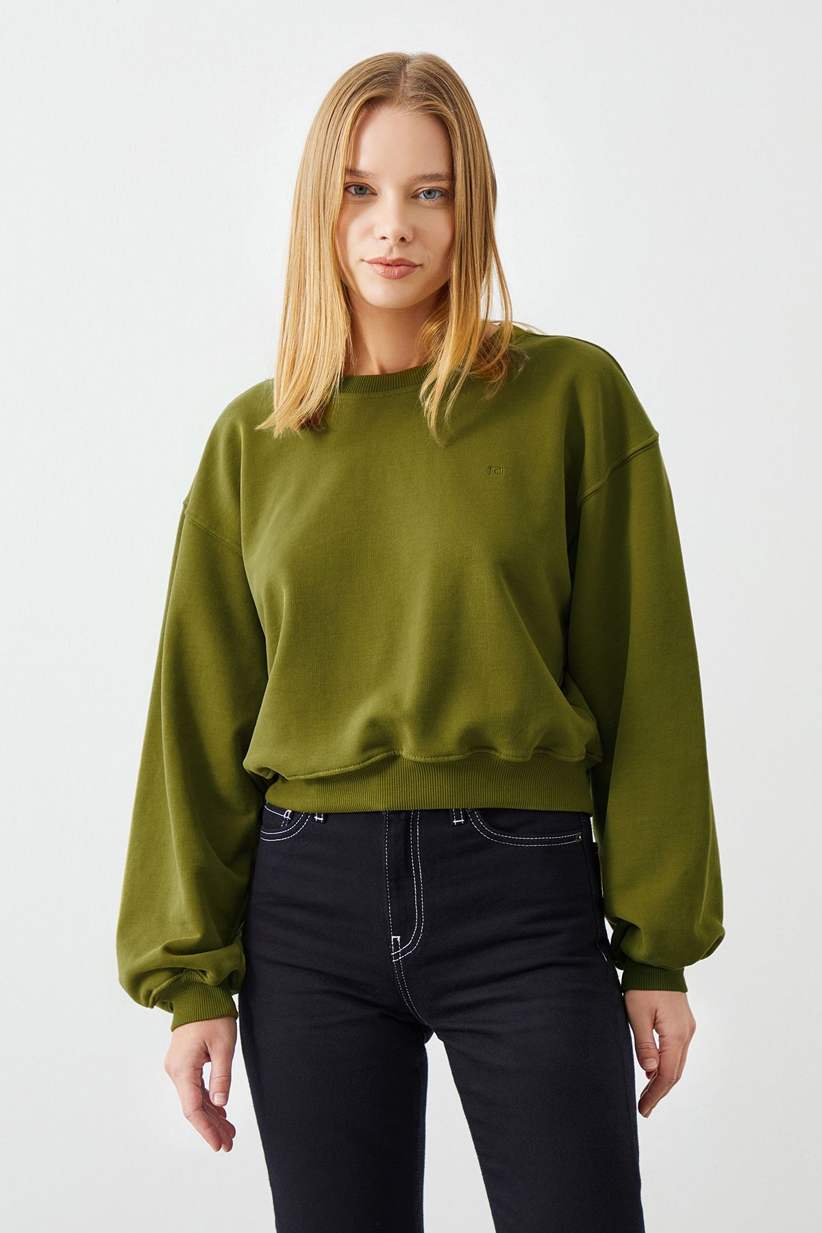 Eco-Conscious Woman Wearing VITA Avocado Crop Sweatshirt - Stylish and Sustainable