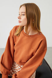 Woman wearing Ra Denim Vita Crop Oversize Orange Women's Sweatshirt