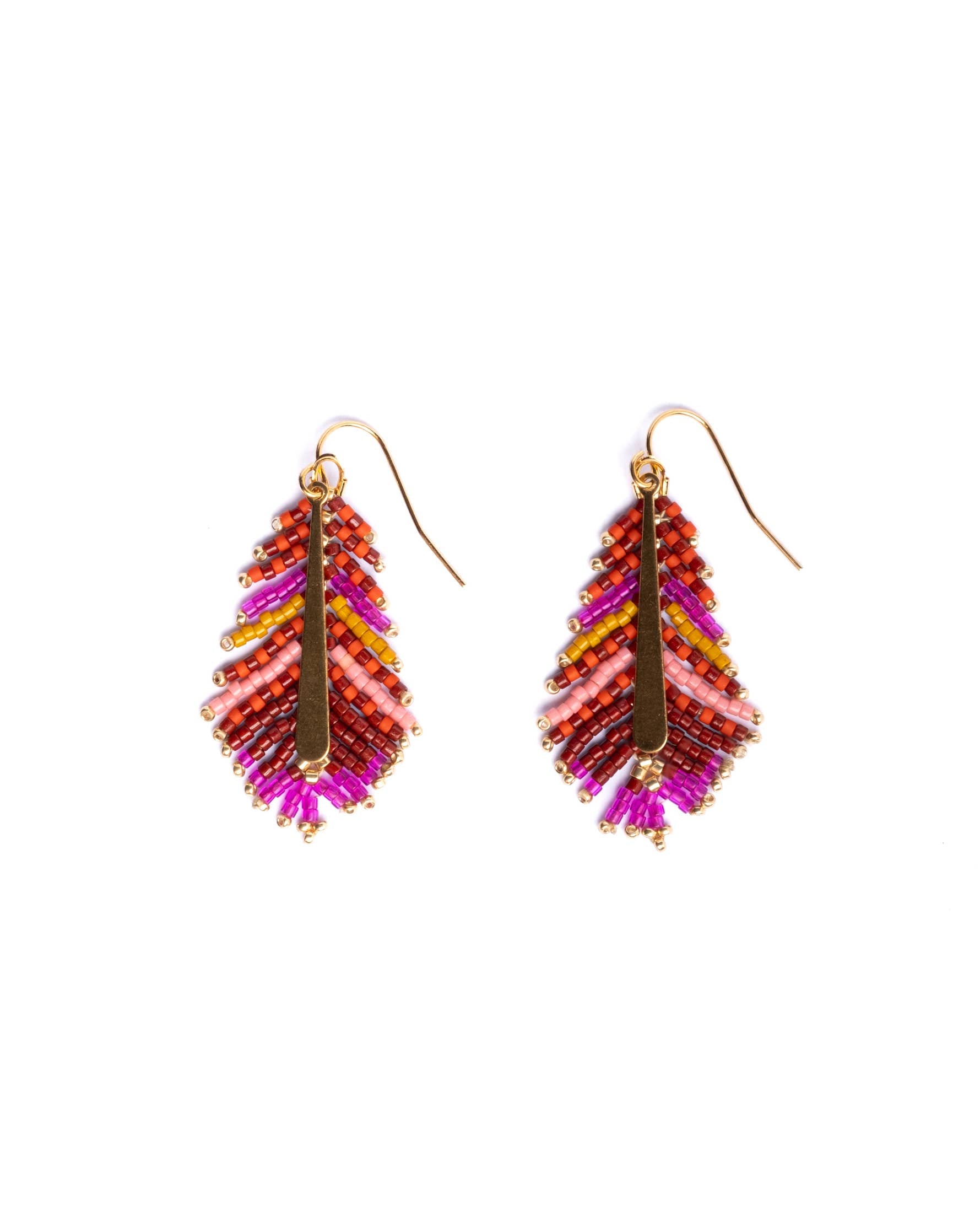Vibrant magenta and orange beaded earrings in a feather-inspired shape, handmade by Colombian artisans for Mayana Designs