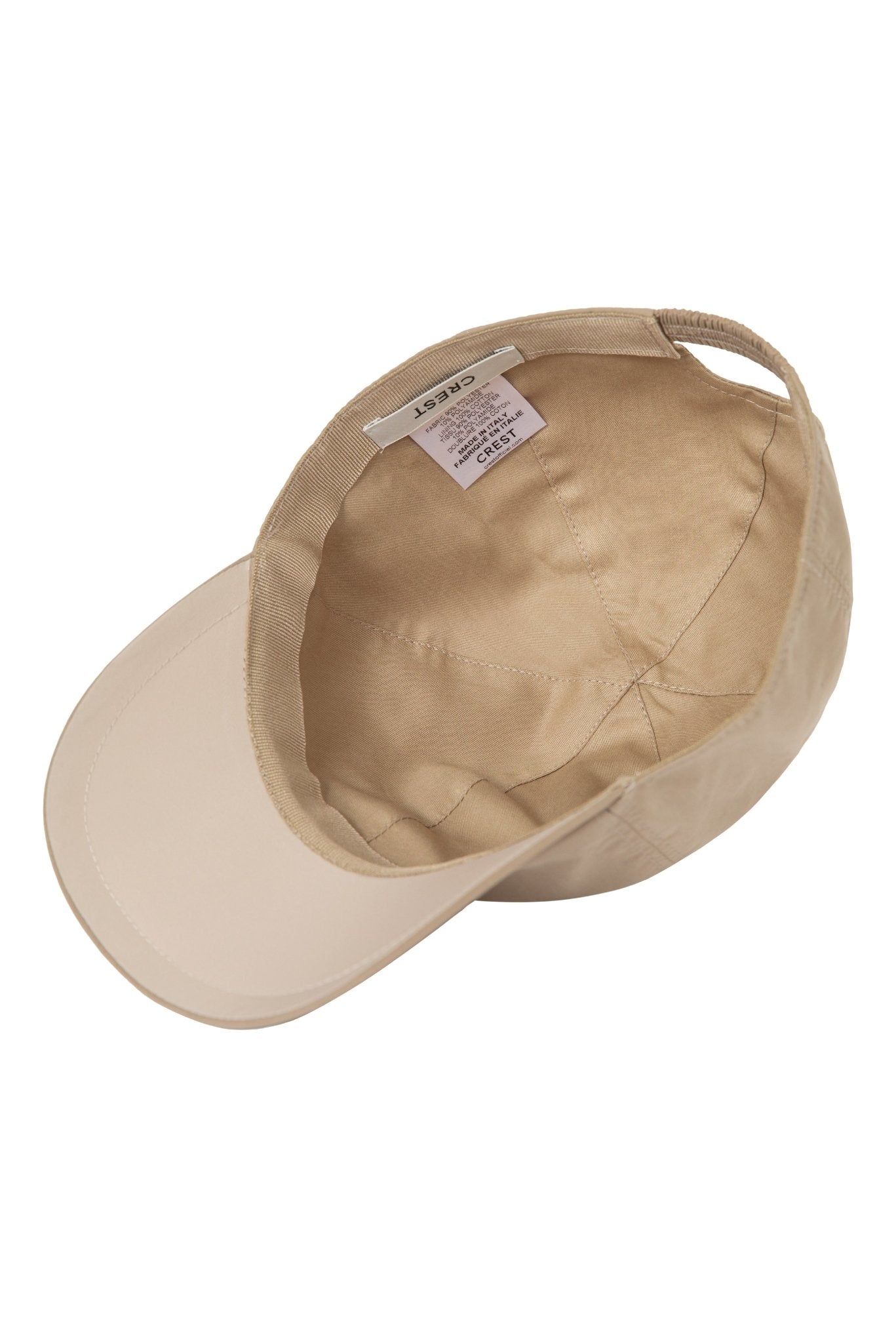 Interior view of CREST beige baseball cap, featuring 100% cotton lining for comfort.
