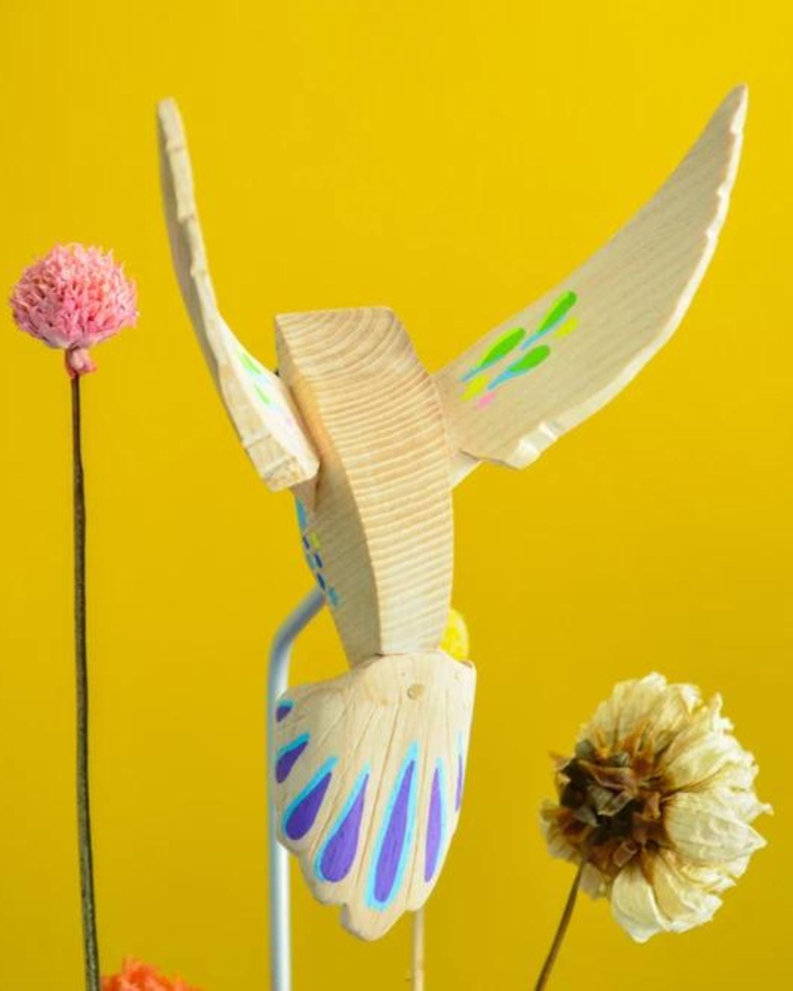 Hand-painted Hummingbird Sculpture, a folk art tribute