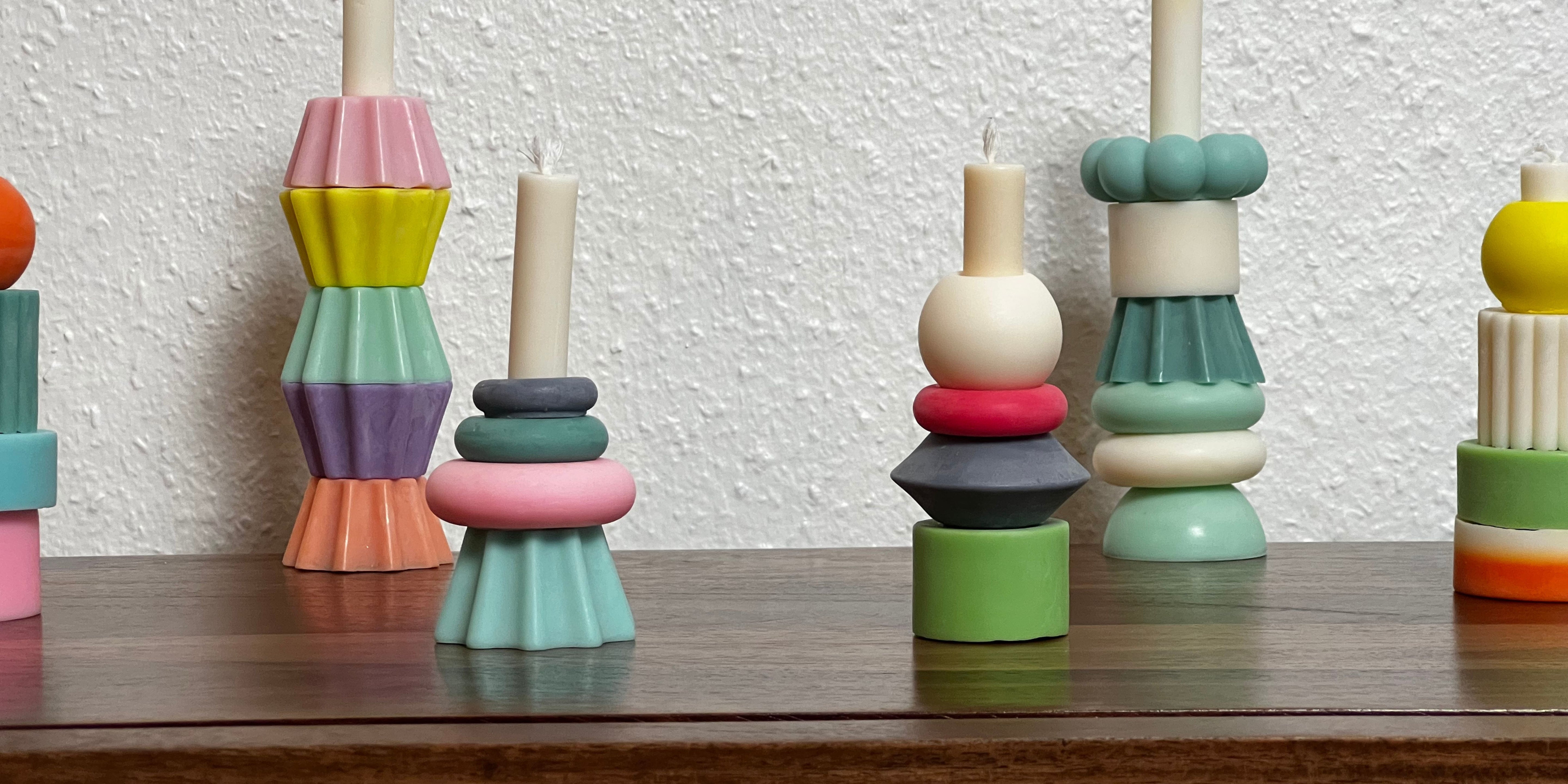 Display of colourful candles by Swiss Brand KANDL