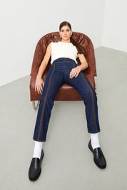 Woman confidently rocking the Mira Boyfriend Fit Embroidered Jeans.