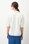 POENA Sleeveless Shirt in Ecru made from sustainable fabric.