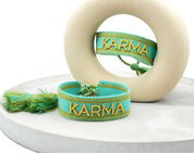 KARMA Statement-Armband gewebt, bestickt