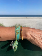 KARMA Statement-Armband gewebt, bestickt