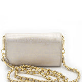 Elegant AETALIA Ary shoulder bag in ecru leather with braided gold chain and vintage gold accents.