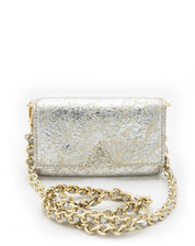 A front-facing view of the Ary Bag, showcasing its silver sheepskin leather and distinctive "A" cut-out design