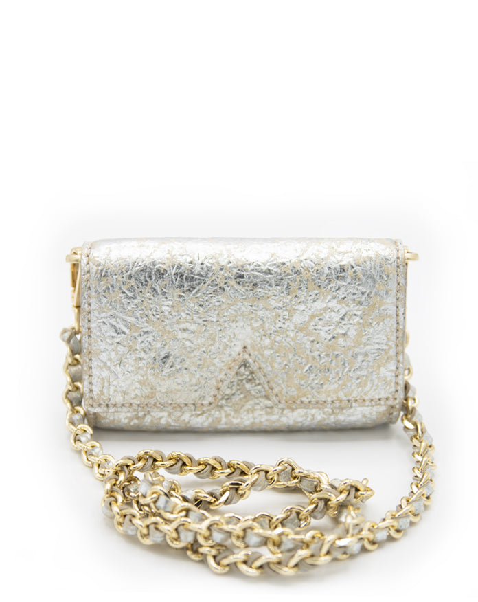 A front-facing view of the Ary Bag, showcasing its silver sheepskin leather and distinctive "A" cut-out design