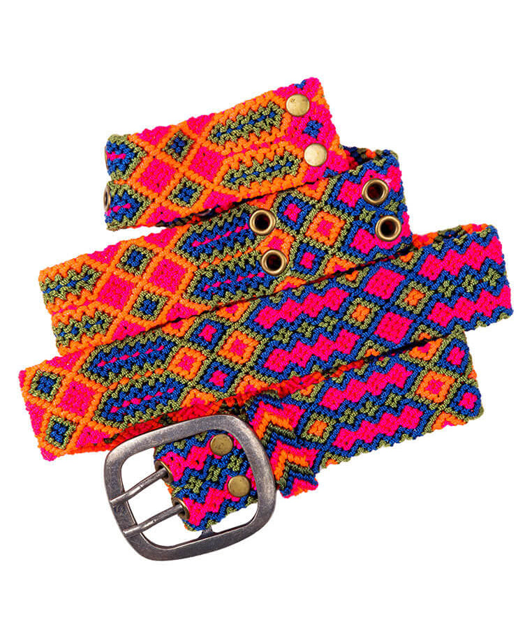 Close-up view of the intricate geometric patterns on the Adriana Festival Belt in neon pink and  blue.