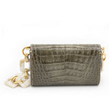 Exclusive Aetalia Ary shoulder bag, handmade in Elba from olive leather with a crocodile print—combining luxury and timeless elegance.