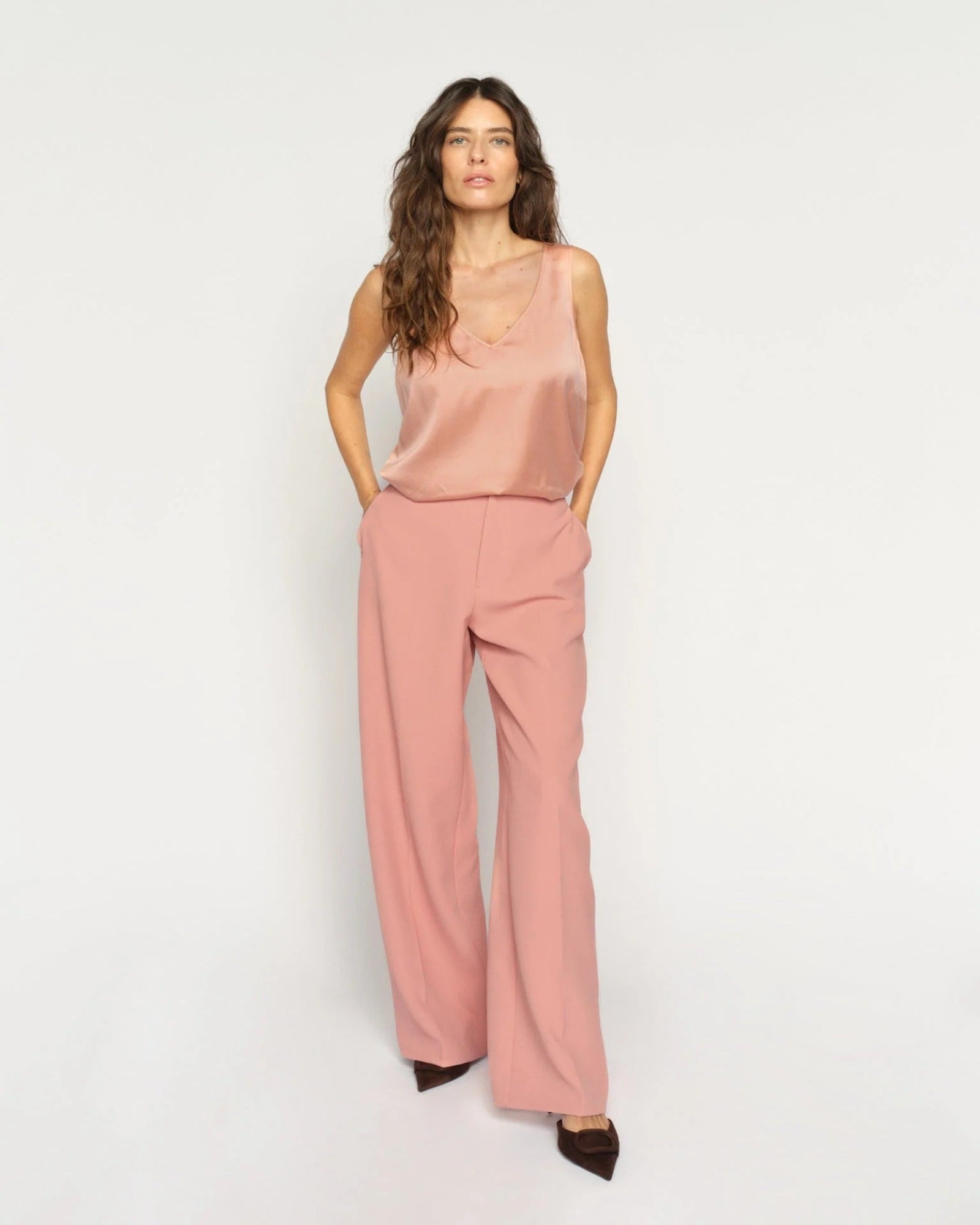 MMAstrid Silk Tank Top in peach with relaxed wide-leg trousers