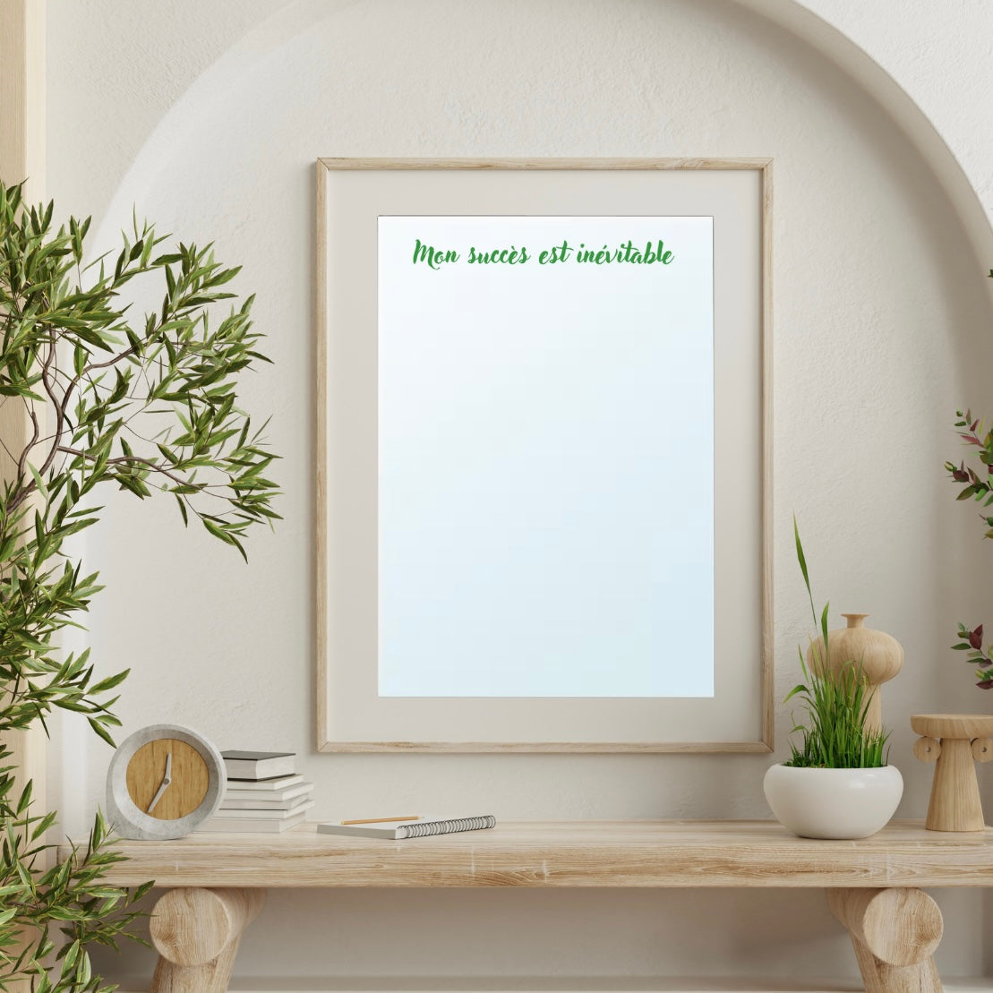 An A4 mirror showcasing the empowering affirmation 'My success is inevitable' in stylish green lettering.
