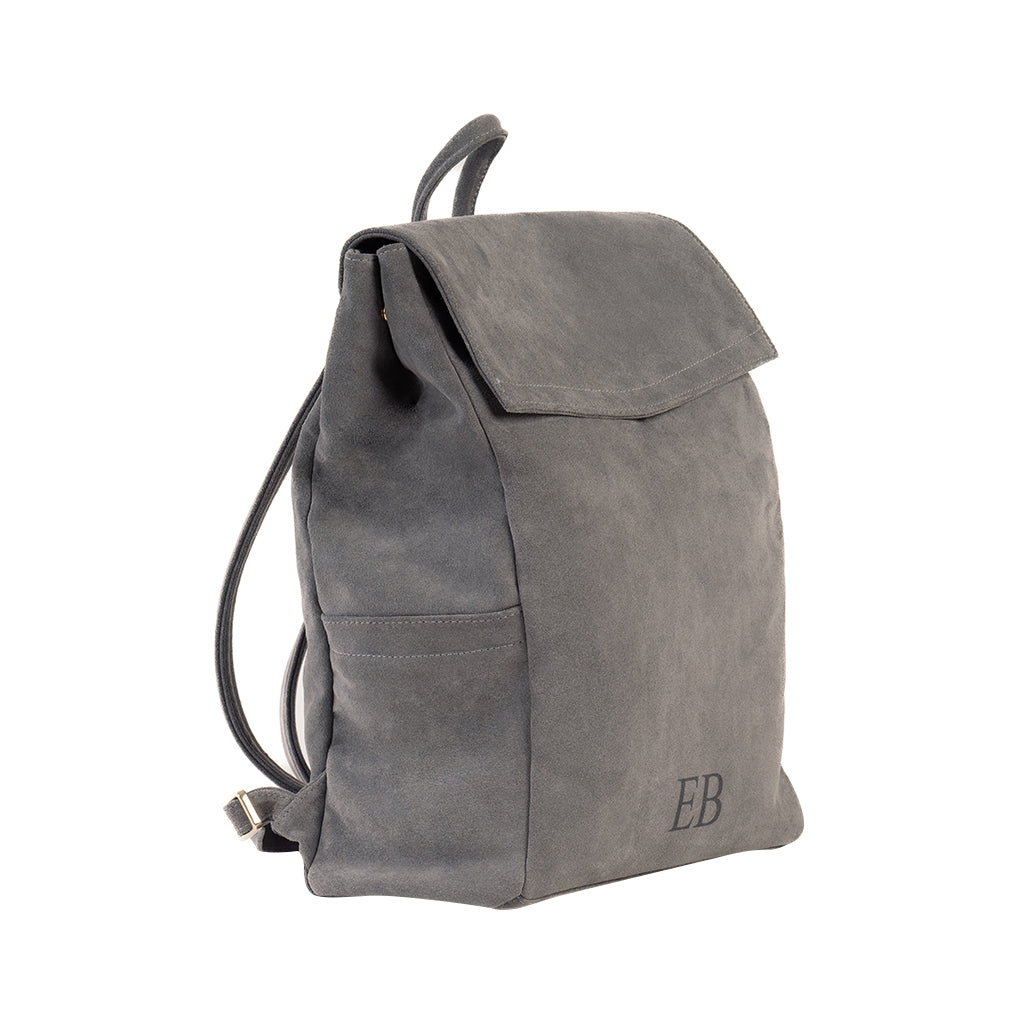 Side view of Emmy Boo Backpack Lipari in grey suede crust leather with adjustable shoulder straps.