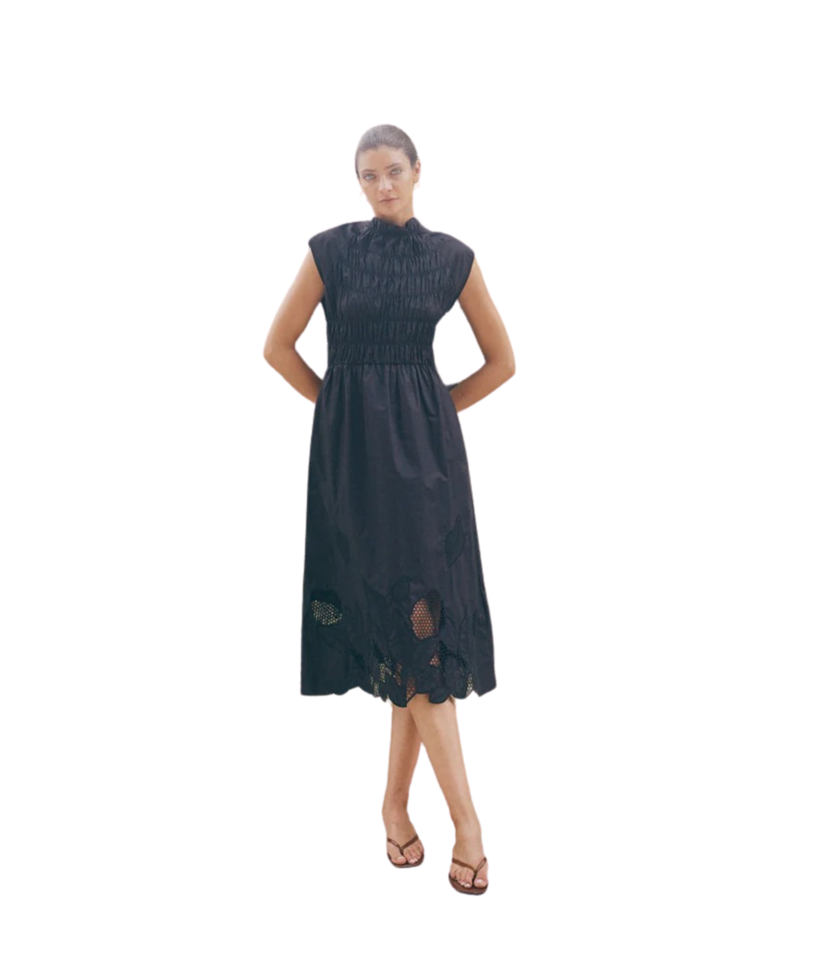 Black sleeveless MMAria Mono dress in breathable organic cotton featuring a smocked bodice and intricate floral embroidery. Ideal for sustainable summer occasion styling.