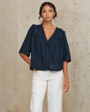 Front view of Frill Detail Top in Navy showing relaxed fit on model