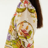 FARM Rio Sand Tropical Scarf Blouse side view highlighting the flowing drape and tropical-inspired print.