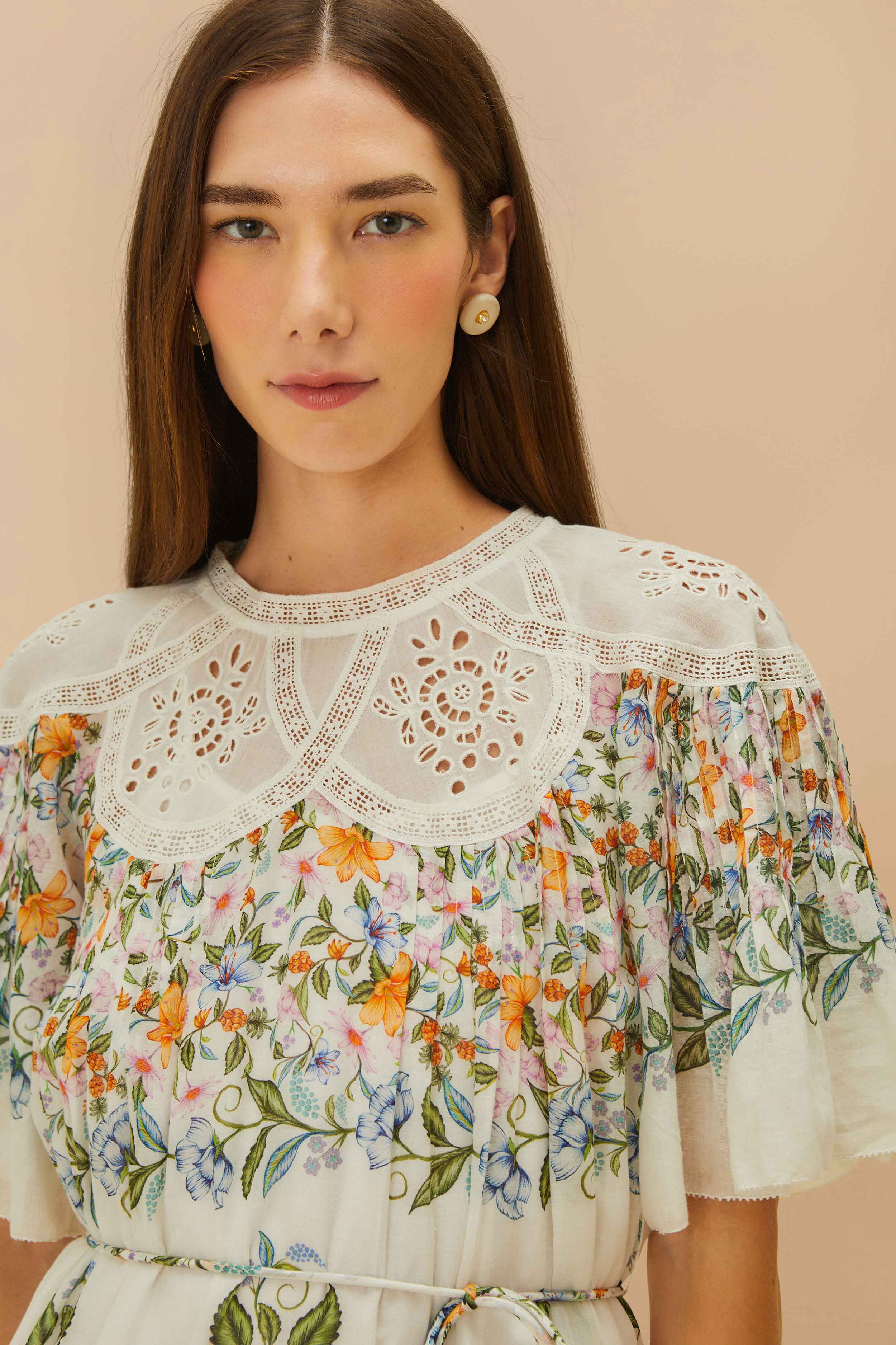 Embrace boho-chic vibes with the Sweet Bloom Mini Dress by FARM Rio, available now at 99things.ch—your go-to for statement fashion