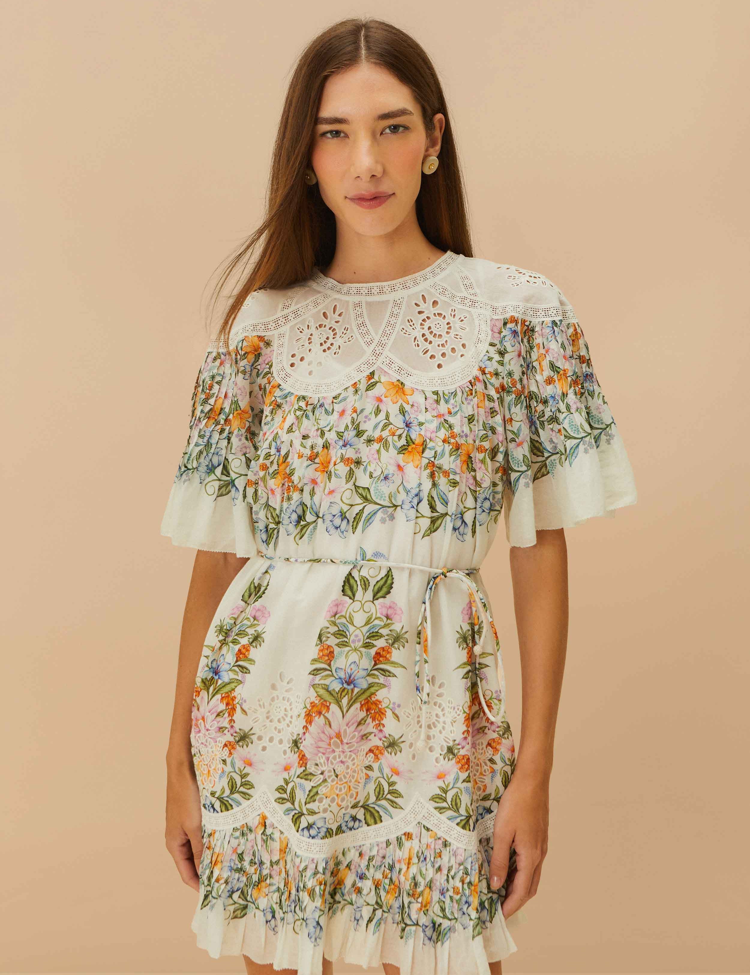 Discover the Off-White Sweet Bloom Bouquet Mini Dress by FARM Rio at 99things.ch—an effortlessly chic floral mini dress that embodies vibrant Brazilian fashion