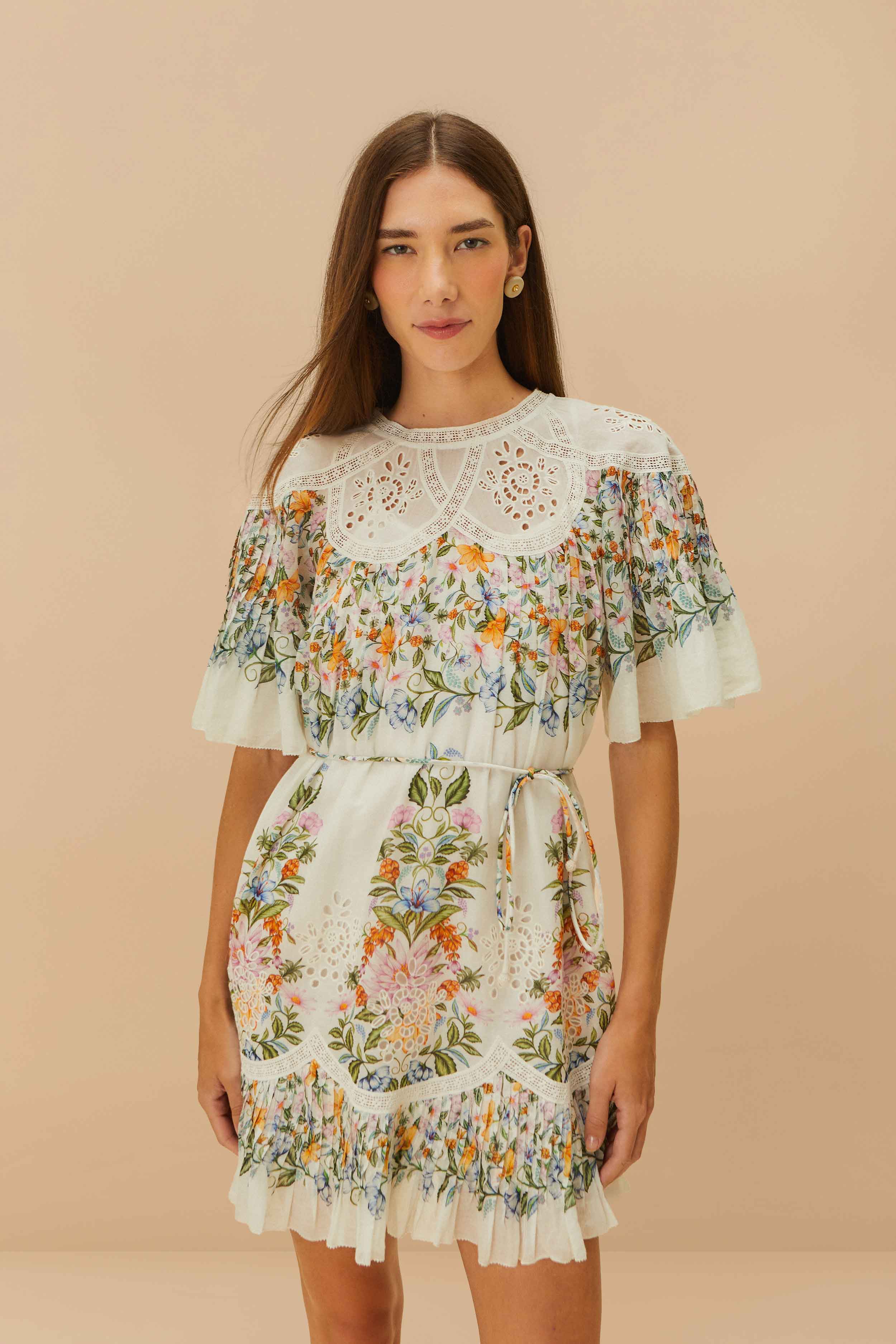 Discover the Off-White Sweet Bloom Bouquet Mini Dress by FARM Rio at 99things.ch—an effortlessly chic floral mini dress that embodies vibrant Brazilian fashion