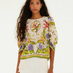 FARM Rio Sand Tropical Scarf Blouse front view featuring a tropical scarf print and elegant draped silhouette.