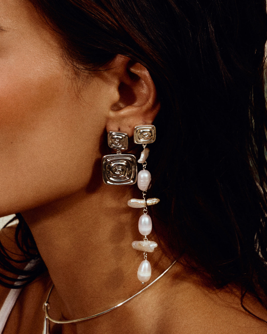 Luv AJ Seychelles Statement Earrings in silver on model