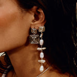 Luv AJ Seychelles Statement Earrings in silver on model
