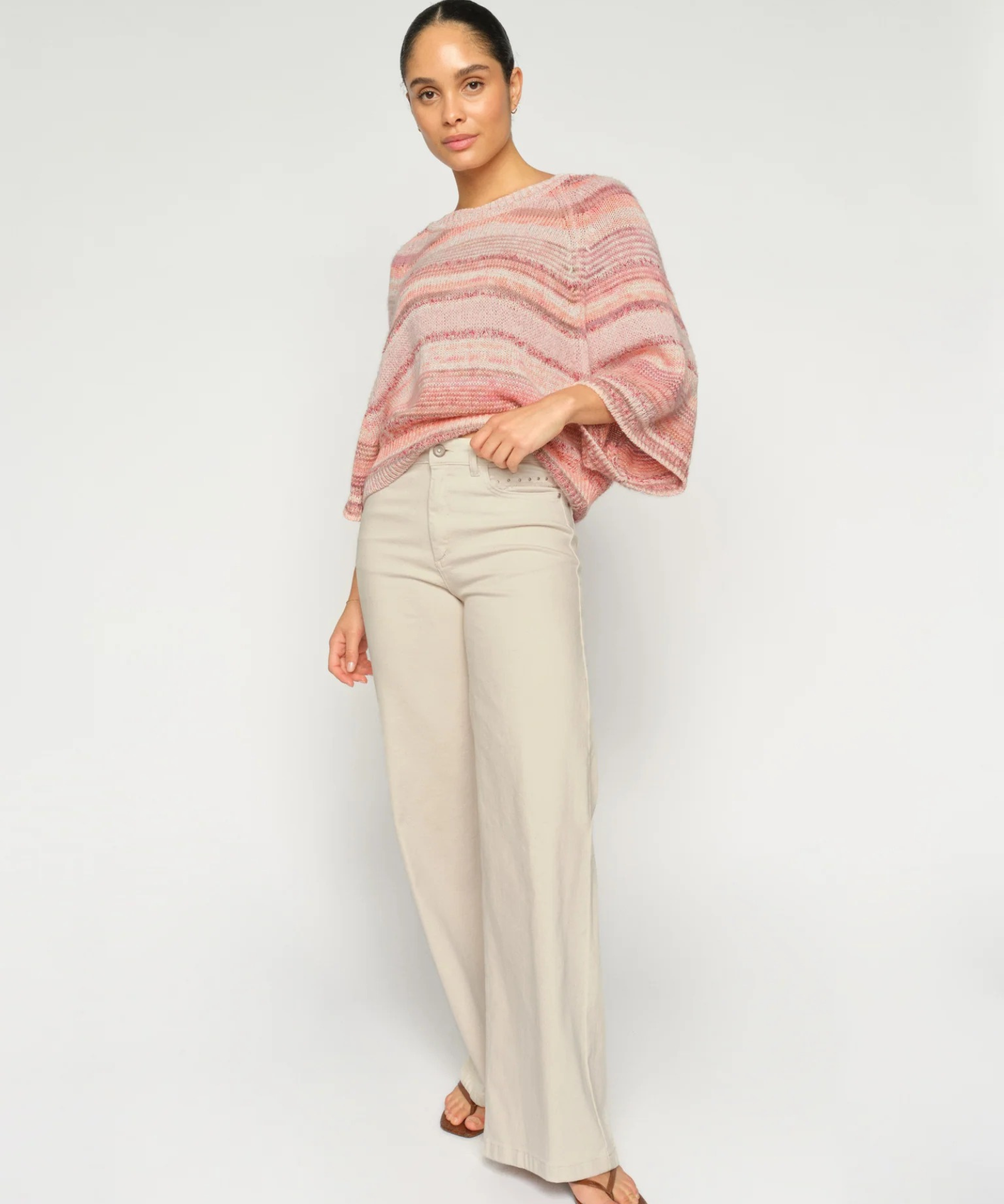 MMEdele Knit Pullover in Peachy, front view on model, 3/4 sleeves visible