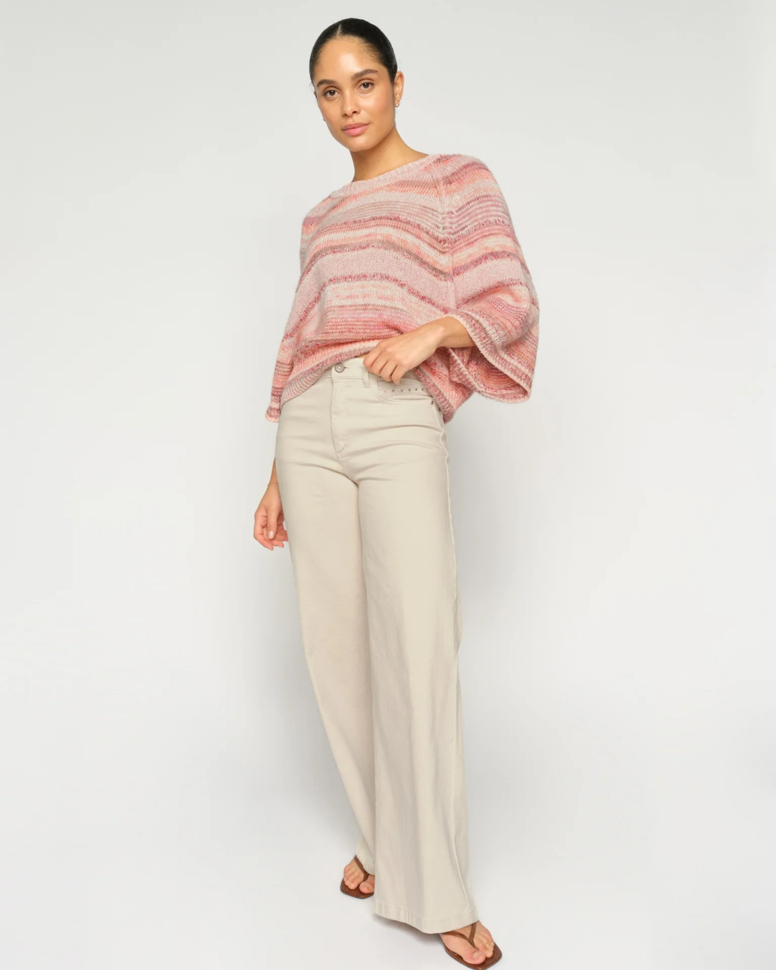 MMEdele Knit Pullover in Peachy, front view on model, 3/4 sleeves visible
