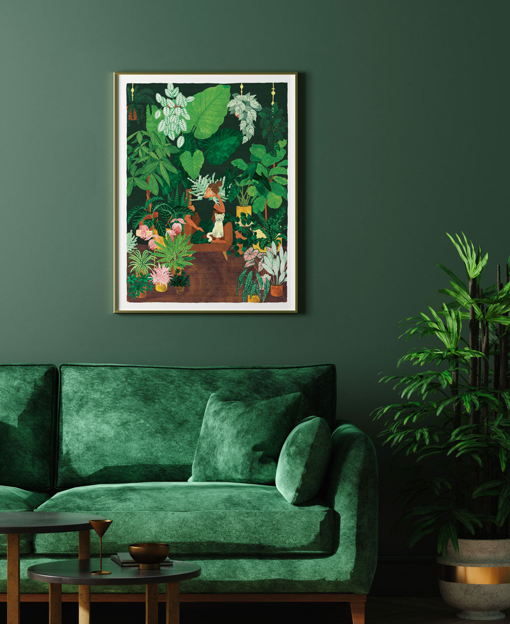 Plant Addict Lady poster by All the Ways to Say framed above a green velvet sofa