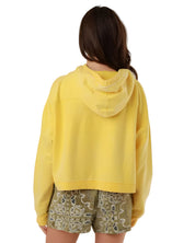 Rear view of the Amy yellow zip-up hooded jacket on a model, highlighting its casual loose drape and premium stitched finishes.