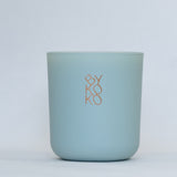 BYKOKO Amalfi Coast scented candle in matt sea-green glass
