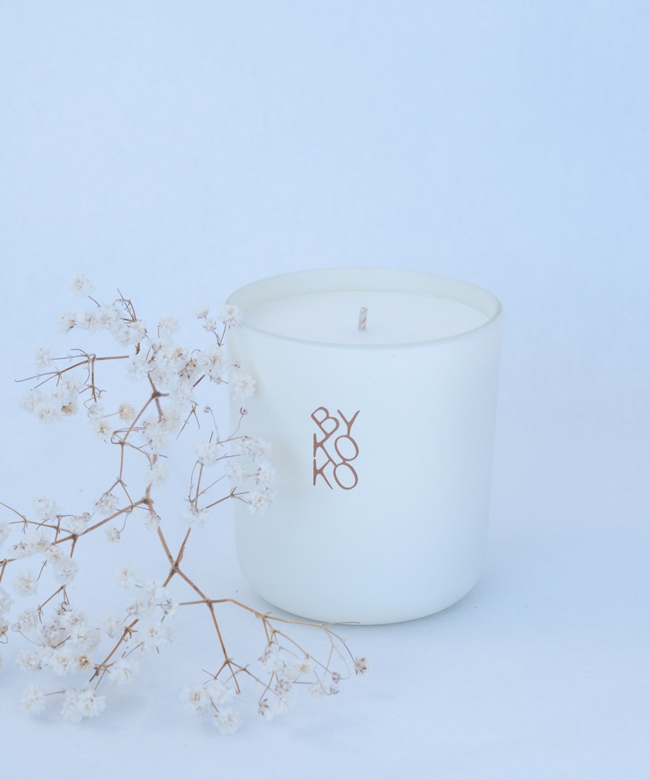 BYKOKO Edelweiss Bloom scented candle styled with dried flowers