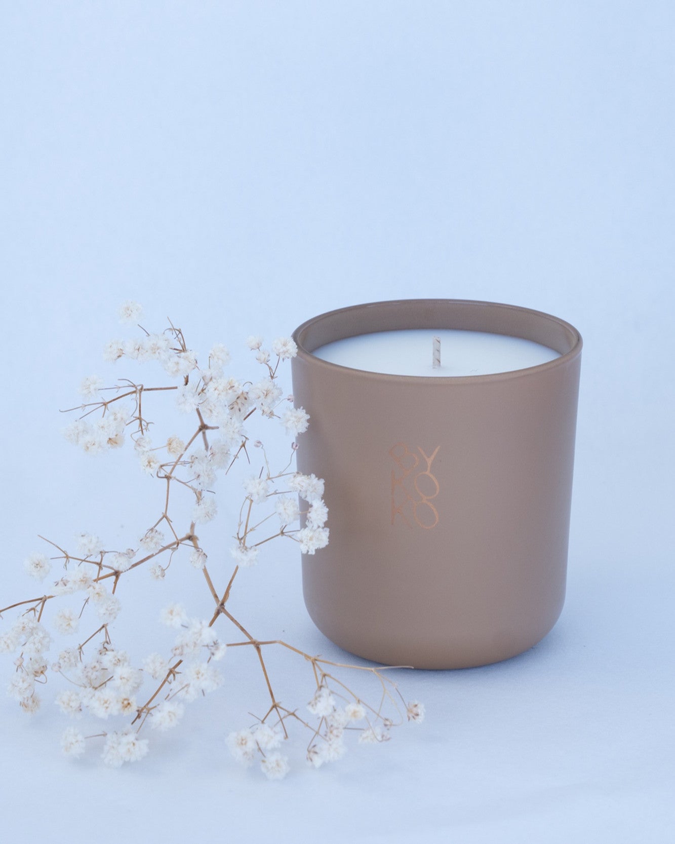 BYKOKO Golden Amber scented candle styled with dried flowers