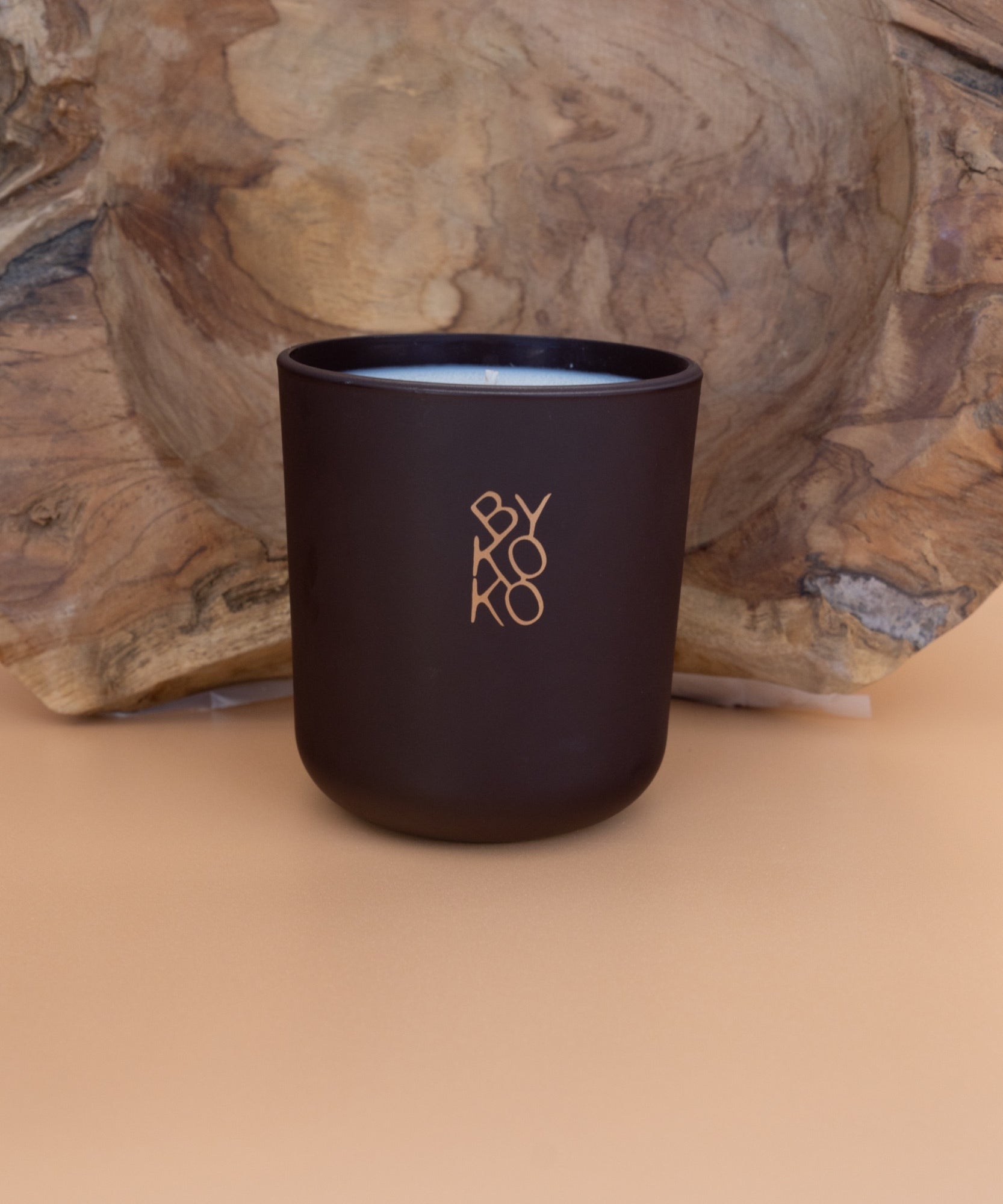 BYKOKO Havana Lovers scented candle on a wooden backdrop