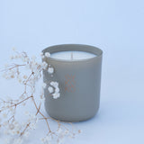 BYKOKO Serene Ritual scented candle styled with dried flowers