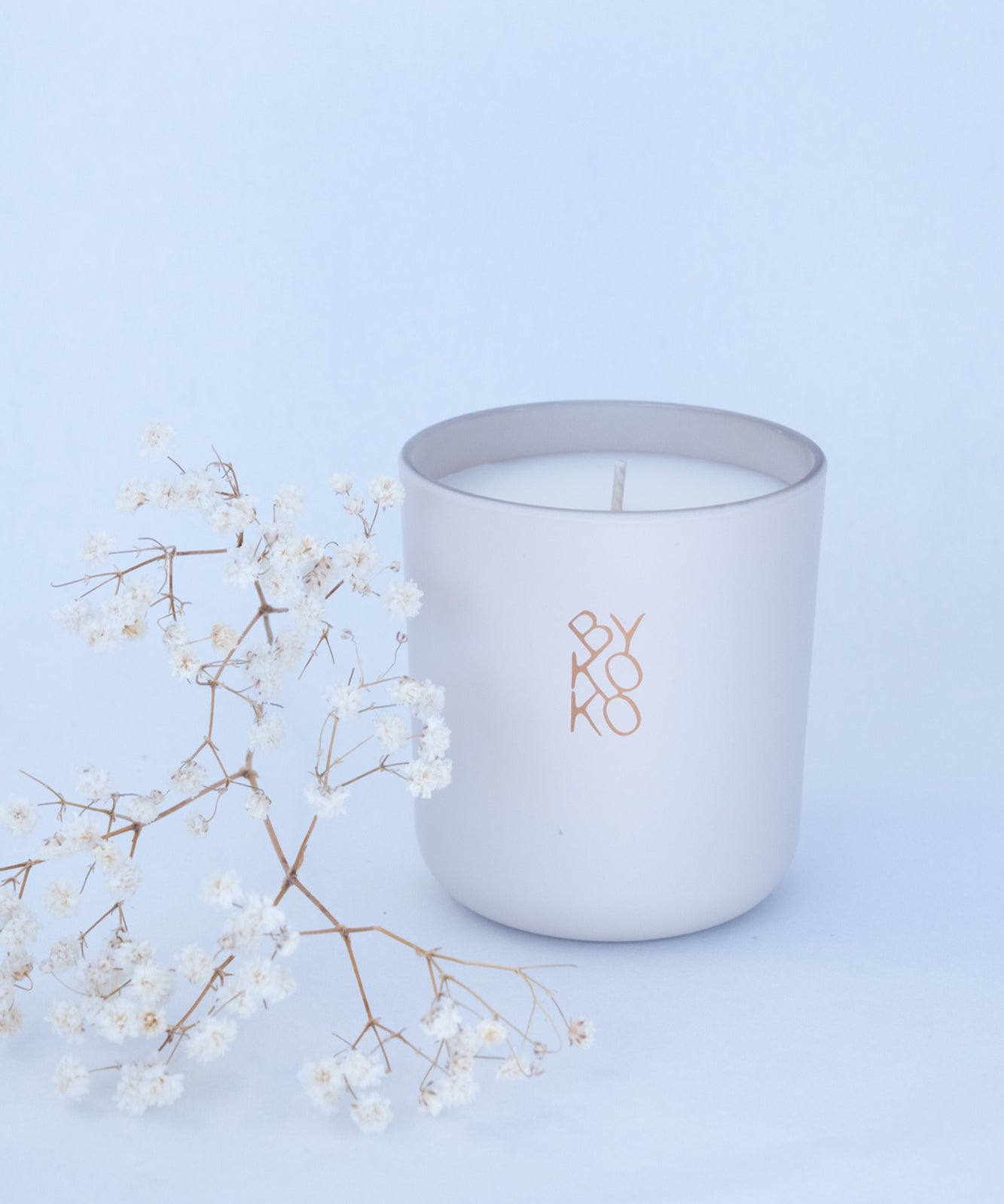 BYKOKO Tea Ceremony scented candle styled with dried flowers