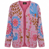 COFUR pink jacket with blue and red suzani-style flowers and red striped trim, made from an upcycled vintage textile