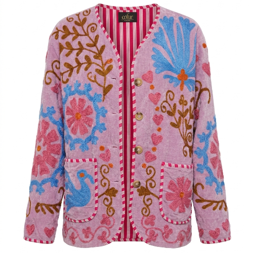 COFUR pink jacket with blue and red suzani-style flowers and red striped trim, made from an upcycled vintage textile