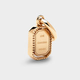 Coluri Talisman charm with a rose pink stone in gold, back view