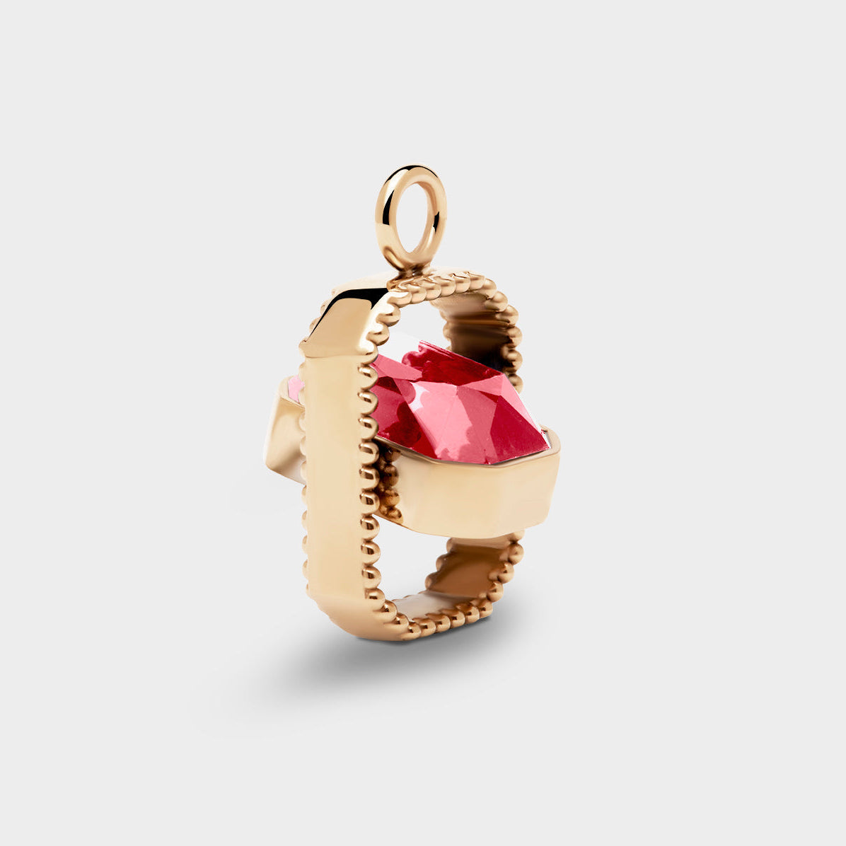 Coluri Talisman charm with a rose pink stone in gold, side view
