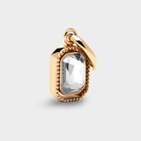 Coluri Talisman charm with a snow-white stone in gold, front view
