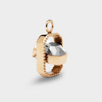 Coluri Talisman charm with a snow-white stone in gold, side view