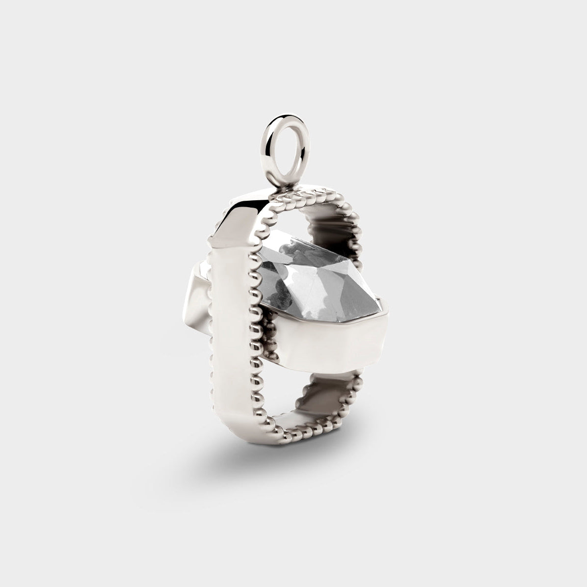 Coluri Talisman charm with a snow-white stone in silver, side view