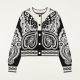 Farm Rio Arabesque Butterfly cropped cardigan in black and white – laid flat